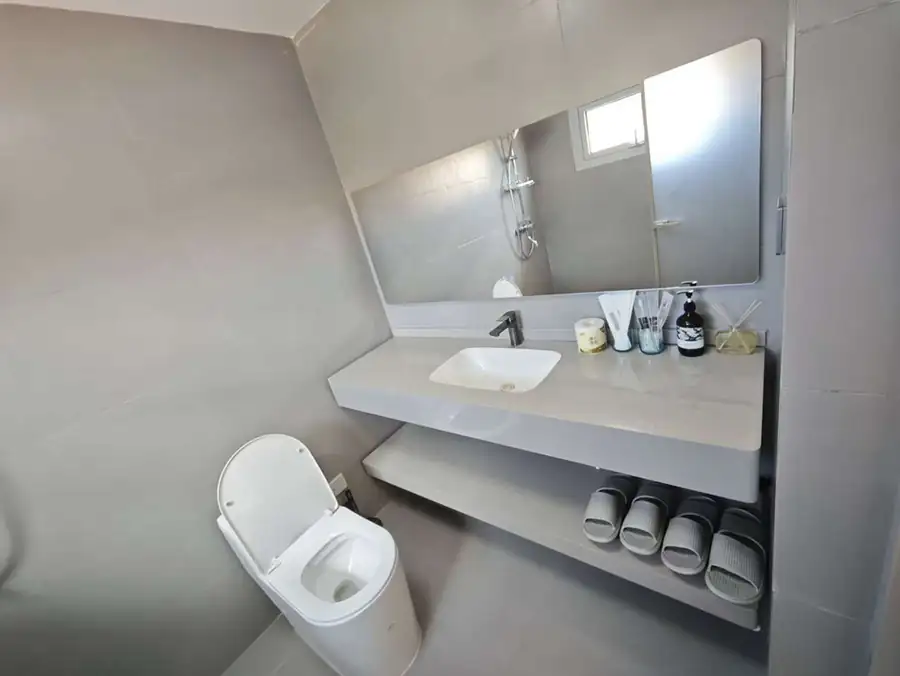 Backlit mirror vanity in the four-bedroom villa Anyu Pool Villa Resort
