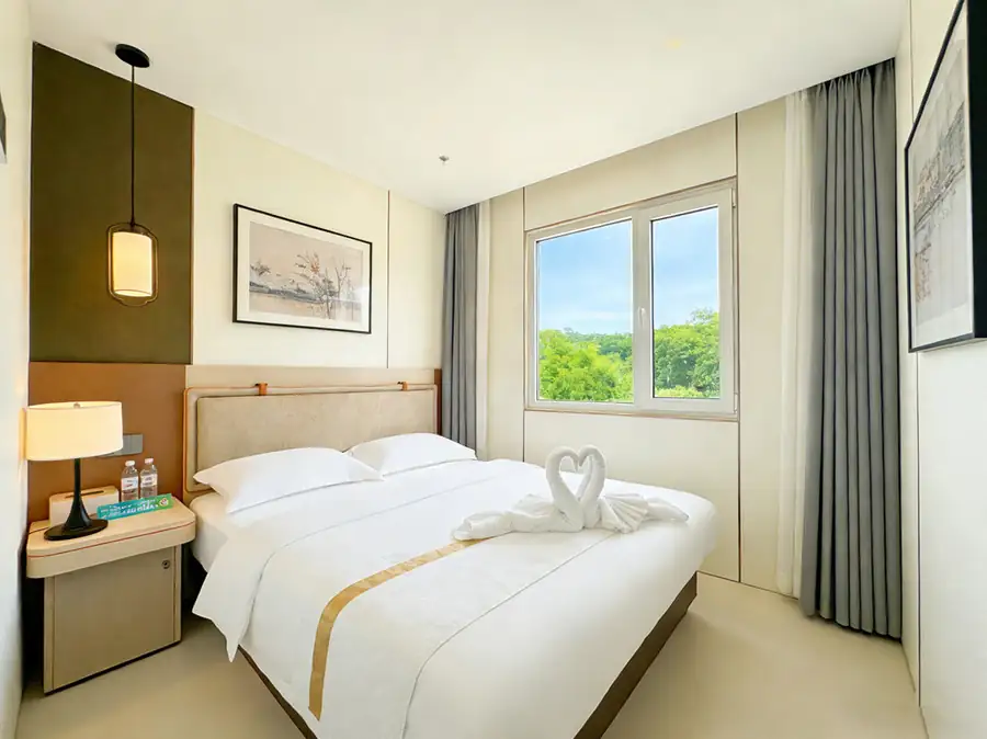 Queen suite lifestyle shot Anyu Pool Villa Resort